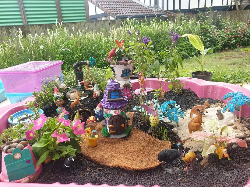 large outdoor fairy garden idea