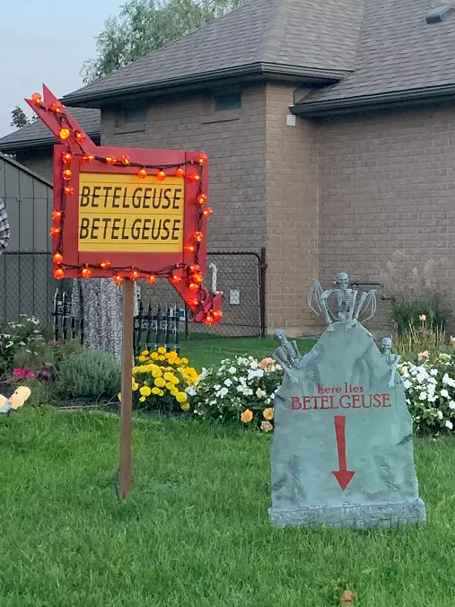 beetlejuice sign tombstone