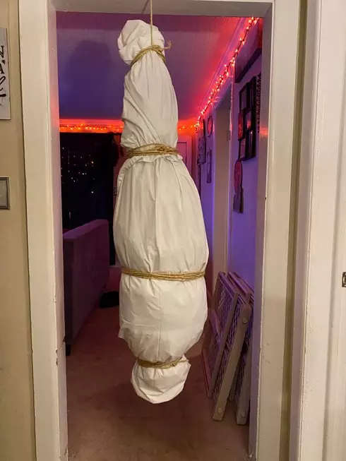 fake dead body hanging