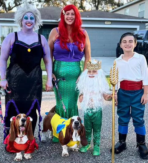 Family Halloween costumes with two dog