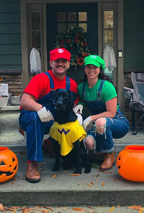 Funny dog and owner costume Mario