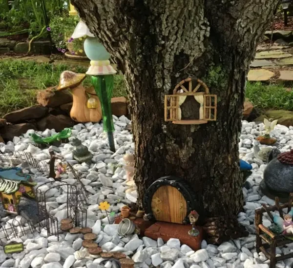 tree stump fairy house ideas 10