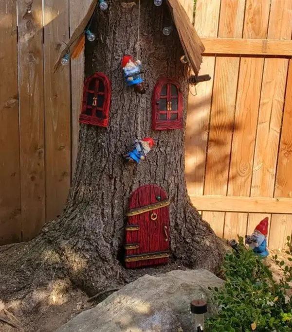 tree stump fairy house ideas 12