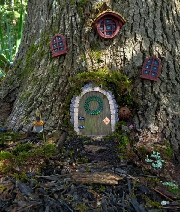 tree stump fairy house ideas 13