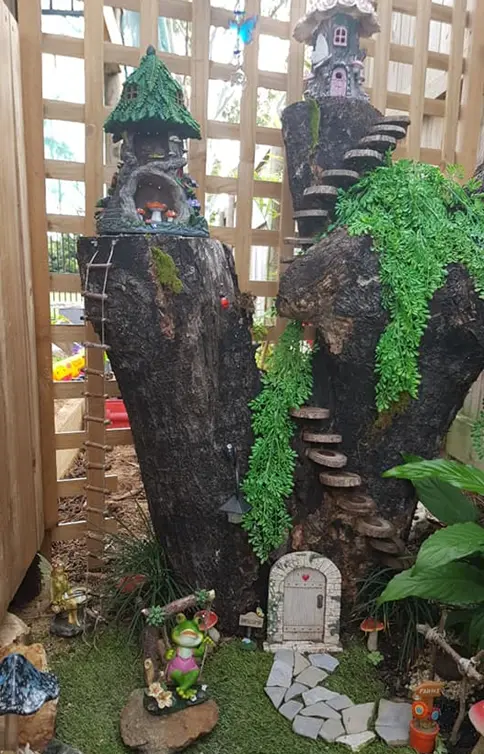 tree stump fairy house ideas 14