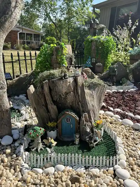 tree stump fairy house ideas 30