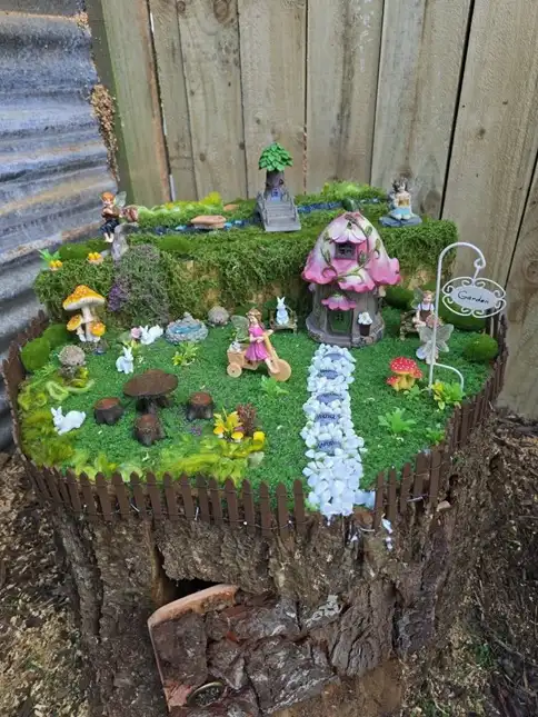 tree stump fairy house ideas 31